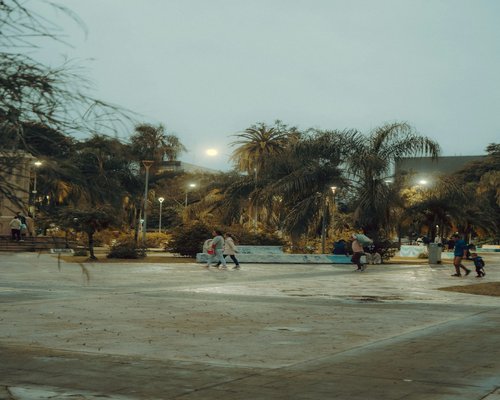 People walking in an Indian neighborhood park in the morning
