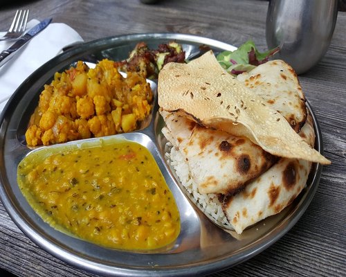 A well balanced Indian Thali with vegetables and chapati