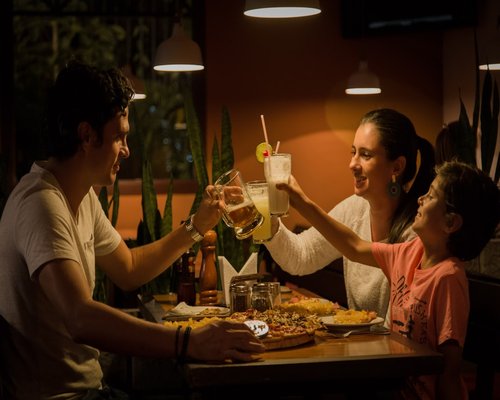 Family eating dinner together without mobile phones